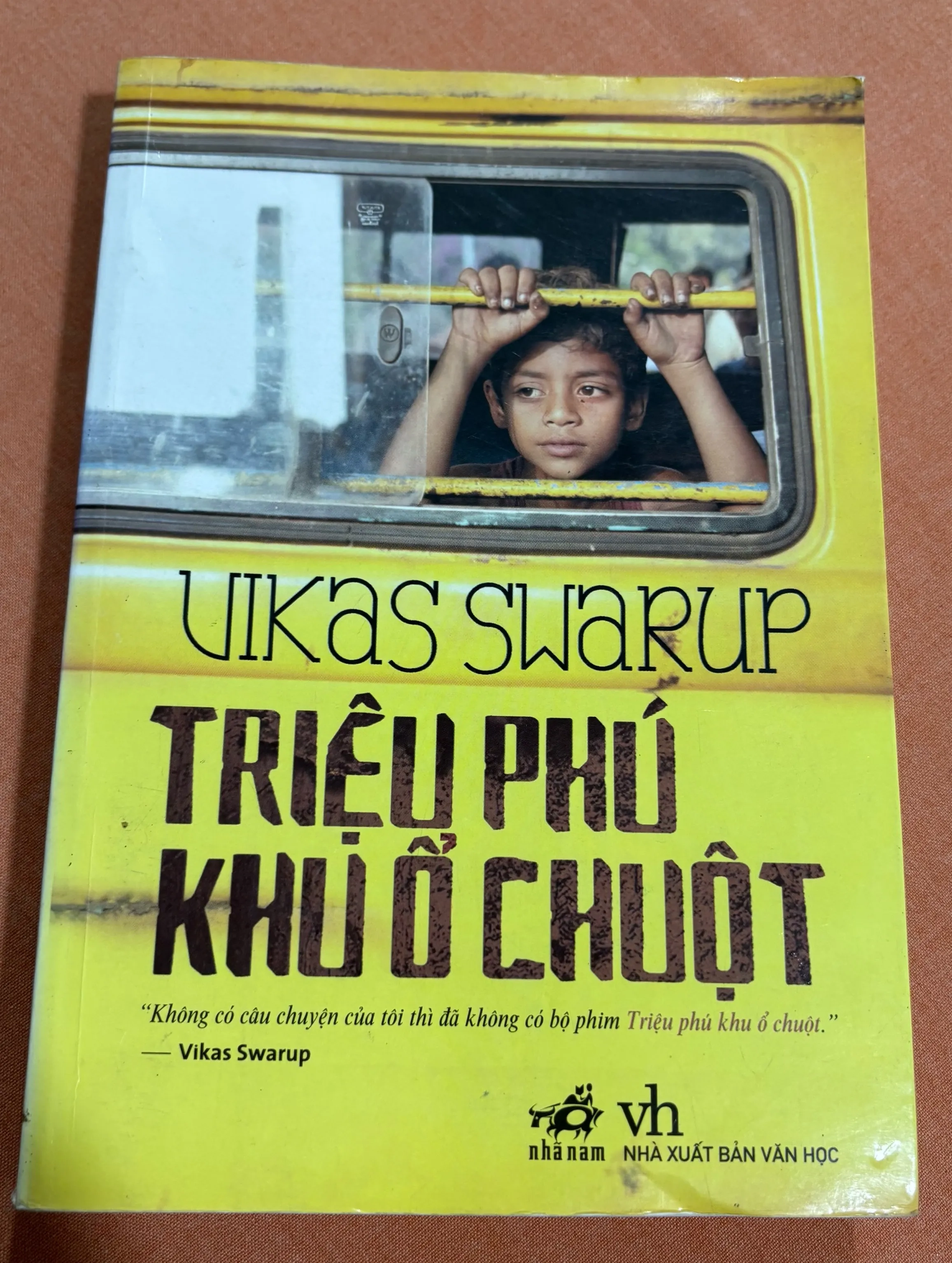 Triệu phú khu ổ chuột 🌊 by  - Sách Book Cover - Ngọc Hiển Books
