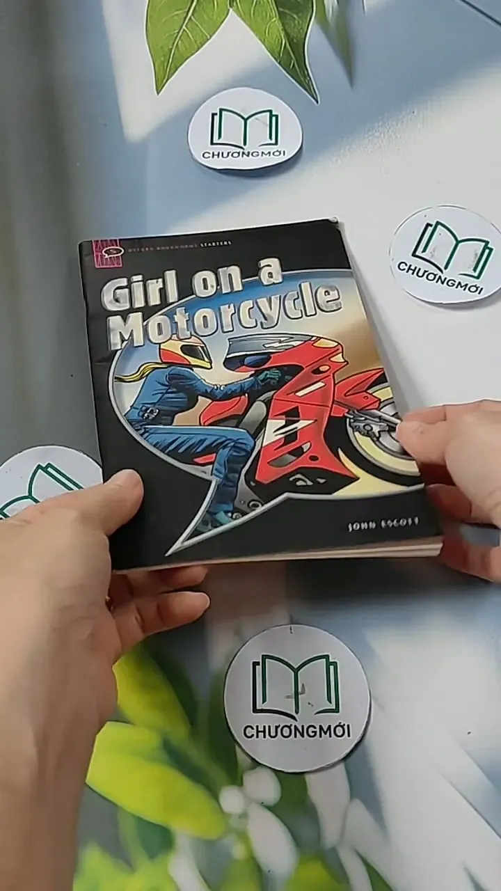 Girl on a Motorcycle  - John Escott  703124