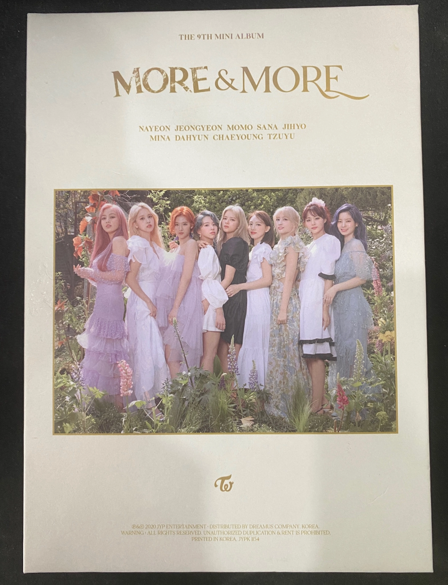 twice album mini More and more đã khui seal, gồm CD đĩa, tặng kèm ảnh thành viẻn by  - Sách Book Cover - Ngọc Hiển Books