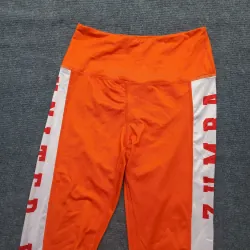 Quần thể thao dài tập thể dục màu cam 933369