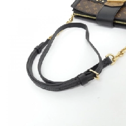 Túi xách đeo vai Louis Vuitton Monogram Reverse Trunk Clutch M43596 612081