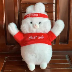 Gấu bông trắng cổ động