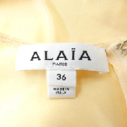 Áo ALAIA AA9H1193W039A - Hàng hiệu Authentic 814600