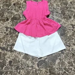 Sét đùi , quần trắng áo hồng, size m, chưa sử dụng 