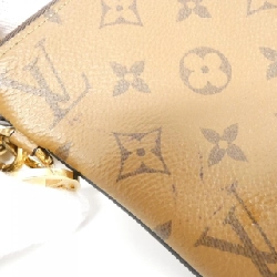 Túi đeo chéo Monogram Trio M68756 623965