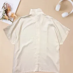 Áo sơmi hiệu Uniqlo màu kem  791326