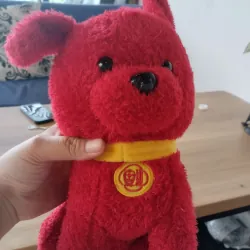 một con thú nhồi bông hình chú chó màu đỏ. Hàng 2hand