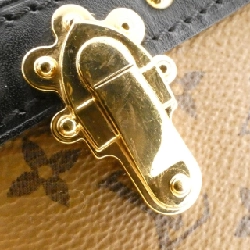 Túi xách vai Louis Vuitton Monogram Reverse Trunk Clutch M43596 610311