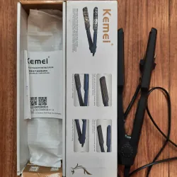 Máy là tóc Kemei màu đen