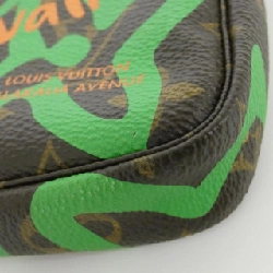 Túi xách mini Louis Vuitton Monogram Tai Chienne M67706 - Hàng hiệu Authentic 769471