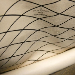 Túi xách đeo vai Louis Vuitton Monogram Reverse Trunk Clutch M43596 611712