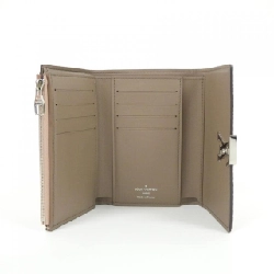 Ví Louis Vuitton Trillon Portefeuille Capucines Compact M62156 622216