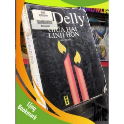 (TẶNG BOOKMARK) Giữa Hai Linh Hôn mới 60% ố vàng, bẩn bìa 1999 M. Delly RBK0906 SÁCH VĂN HỌC