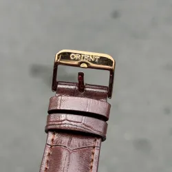 Đồng hồ Orient chính hãng, mặt tròn, dây da nâu, kim loại mạ vàng, phong cách cổ điển 706667