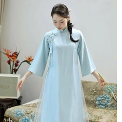  Set Áo dài cách tân vân gỗ màu xanh kèm quần trắng size xl