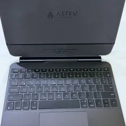 Máy tính xách tay Astronic A1000 bạc, bàn phím số, trạng thái Like New