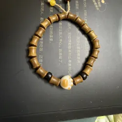 vòng tay gỗ tay mèo mới 