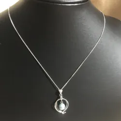 Vòng cổ titan mặt ngọc trai