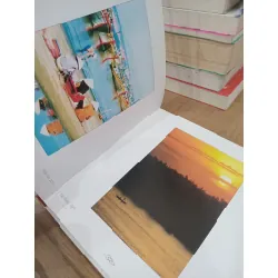 Loose dust blowing against the mountain - Helen Savory 715098