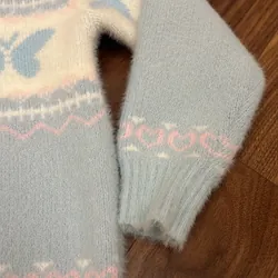 Áo len lông bé gái CN size 140 màu xanh nhạt ít mặc 689516