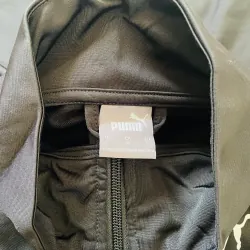 Trang phục thể thao Puma đen phối sọc dài tay quần jogger 790082