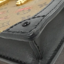 Túi xách đeo vai Louis Vuitton Monogram Reverse Trunk Clutch M43596 - Hàng hiệu Authentic 802693