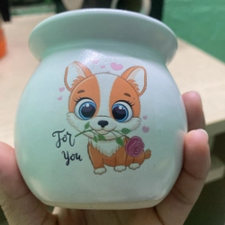 Chậu mini hình bầu dục màu trắng có hình cún dễ thương màu vàng, bề ngoài láng mịn 471823
