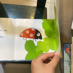 Sách đố vui lật giở song ngữ : Đoán xem là gì ? - Guido Van Genechten  1027410