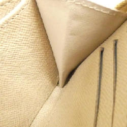 Ví tiền xu Louis Vuitton Monogram Laminated Jacquard Zippy M82483 621295