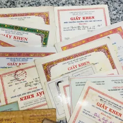 Lô sổ liên lạc + giấy khen 9x  994282