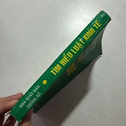 Tìm hiểu luật kinh tế - Trần Anh Minh - 1995s 759424