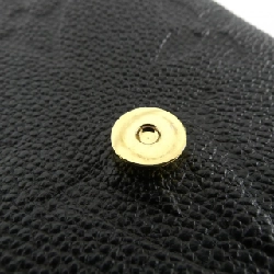 Ba lô Tiny Monogram Empreinte Louis Vuitton M80596 609405