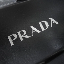 Giày sandal monolith logo tam giác PRADA 1X853M bằng cao su 660540
