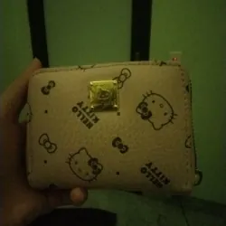 Ví cầm tay Hello Kitty màu hồng nhạt, nhiều ngăn. 949884