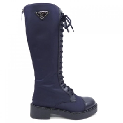 Giày bốt dài PRADA với logo hình tam giác 1W906M