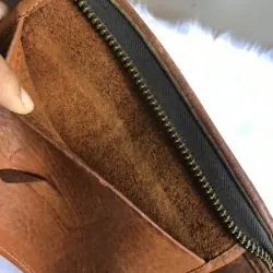 Túi loại cầm tay . COACH USA màu da bò 936341