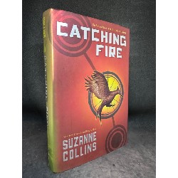 Catching fire (Hunger games) Suzanne Collins - Bìa cứng New 80% SBM.VH0706