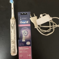 Bàn chải điện Oral B Braun với 2 bàn chải mới nguyên tem