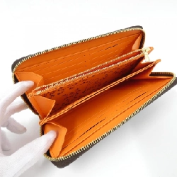 Ví Zippy Catgram Louis Vuitton M63875 621752