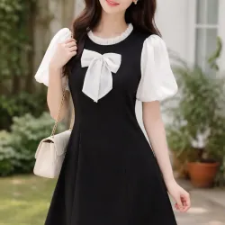 Đầm nữ cổ nơ tay bồng màu đen trắng phối voan tiểu thư