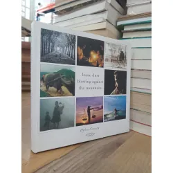 Loose dust blowing against the mountain - Helen Savory 715098