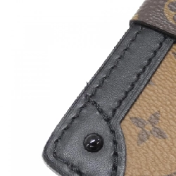 Túi xách đeo vai Louis Vuitton Monogram Reverse Trunk Clutch M43596 612081