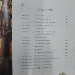 Sách Harry Potter and the Philosopher's Stone mới 90% 524653