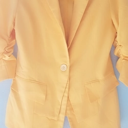 Áo vest vàng  mới 95% 497306
