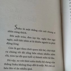 Cuốn sách  "Con chó nhỏ mang giỏ hoa hồng" của tác giả Nguyễn Nhật Ánh. 546358