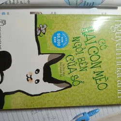 có hai con mèo ngồi bên cửa sổ 591743