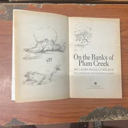 ON THE BANKS OF PLUM CREEK- LURA INGALLS WILDER 674755
