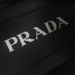 Giày lười Monolis Triangle Logo PRADA 1D649M - Hàng hiệu Authentic 829614