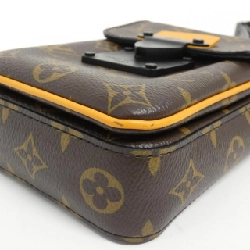 Túi đeo vai Louis Vuitton Monogram Macassar S-Lock Vertical Wearable Wallet M82535 613628