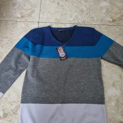 Áo còn tag mới 100%